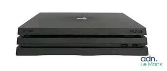 two black laptops stacked on top of each other on a white surface