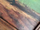 a picture of a painting on a wooden table