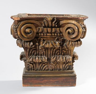 a close up of a wooden pillar with a carved design on it