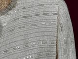 an image of a mannequin wearing a white dress