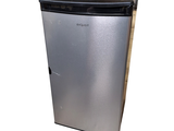 an image of a small silver refrigerator on a white background