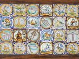 a picture of a picture of a tile with animals on it