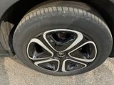a close up of a tire on a car ' s rim