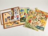 plusieurs livres pour enfants sont alignés sur une surface blanche