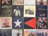 a lot of records that are on the floor