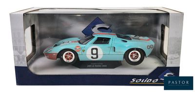 an image of a model of a blue race car in a box