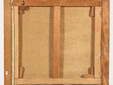 a close up of a painting on a easel on a white background