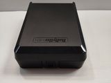 an image of a black box sitting on top of a white table
