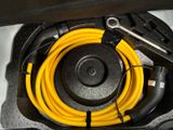 a yellow hose that is connected to a black box