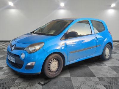 a picture of a blue car parked on a checkered floor