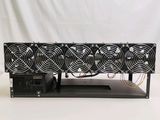 four fans that are on top of a rack