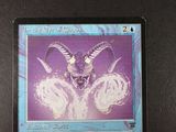 an image of a card with a picture of a horned head