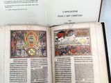 an open book with a picture of a man riding on a horse