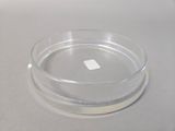 a clear plate with a small square in it