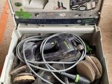 a box with a bunch of tools in it on the floor