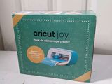 a box of cricutjoy on a white table