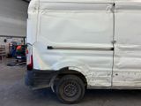 a white van that is parked in a garage