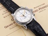 a watch sitting on top of a book on a table