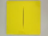 a yellow piece of paper with a black line on it