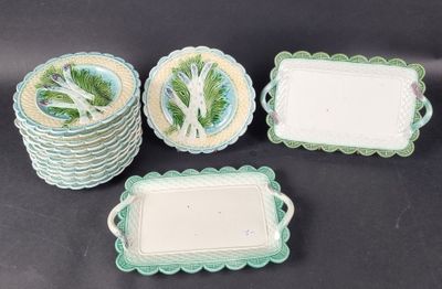 four pieces of green and white dishes and trays on a table