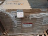a large box with a price tag on it sitting on a pallet