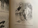 an open book with a drawing of a man and a dog