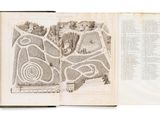an open book with a drawing of a garden in it