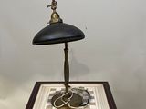 a small table with a lamp on top of it