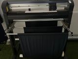 an image of a large digital printer on a stand