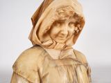 an image of a statue of a woman with a hood on her head