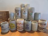 a lot of coffee mugs sitting on a table