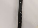 a knife that is laying on top of a piece of paper