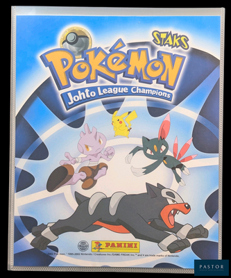 une photo d'un livre sur lequel figure une image de Pokémon