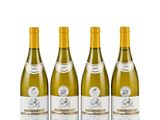 three bottles of white wine sitting next to each other on a white surface