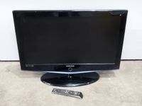 Une télévision de marque SAMSUNG avec sa telecomande. (photo 2)