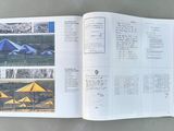 an open book with pictures of umbrellas on the pages