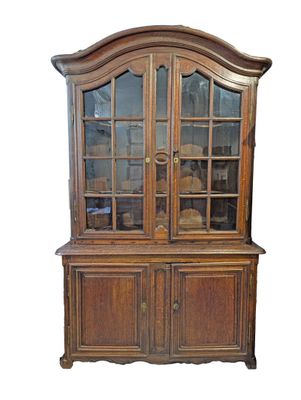 an image of a wooden china cabinet with glass doors