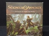 une image représentant une boîte de jeu sur laquelle figure un groupe de personnes dans les bois