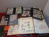 a lot of stamps on the pages of a book