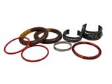 several different types of rubber rings and rings on a white background
