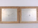 pair of antique wooden mirrors with etched glass panels