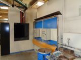 an image of a kitchen with a tv and a sink