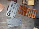 a lot of tools that are sitting on the floor
