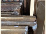 a lot of picture frames that are stacked together