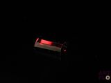 an image of a red light in the dark