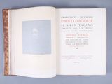 an open book with a picture of a man on it