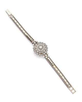 a diamond and silver bracelet, by cartier