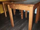 three wooden tables sitting on a hard wood floor