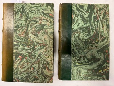une image représentant deux livres ornés de motifs verts et rouges