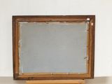 painting of a wooden frame with a mirror on top of it